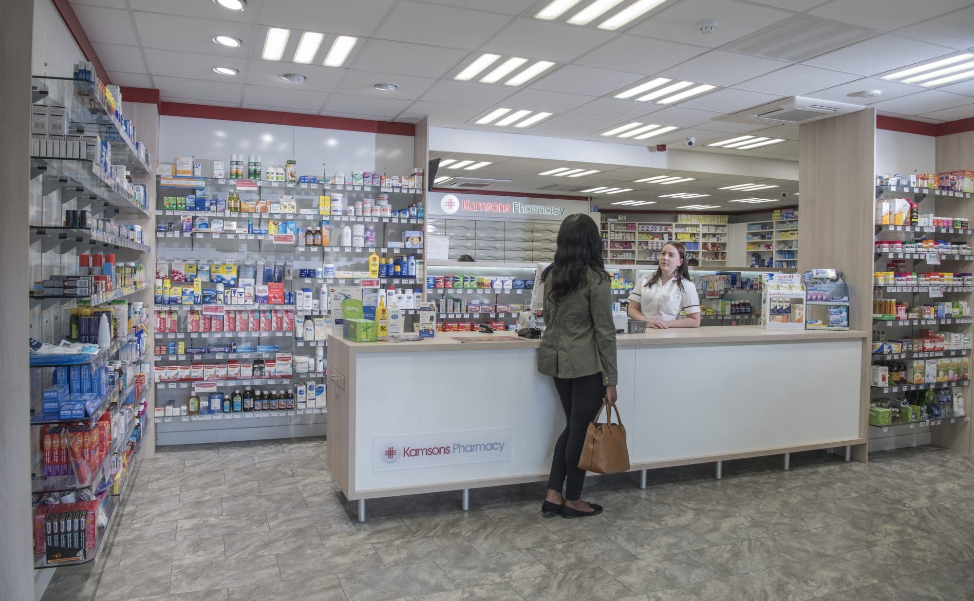 Kamsons Pharmacy storefront and branding