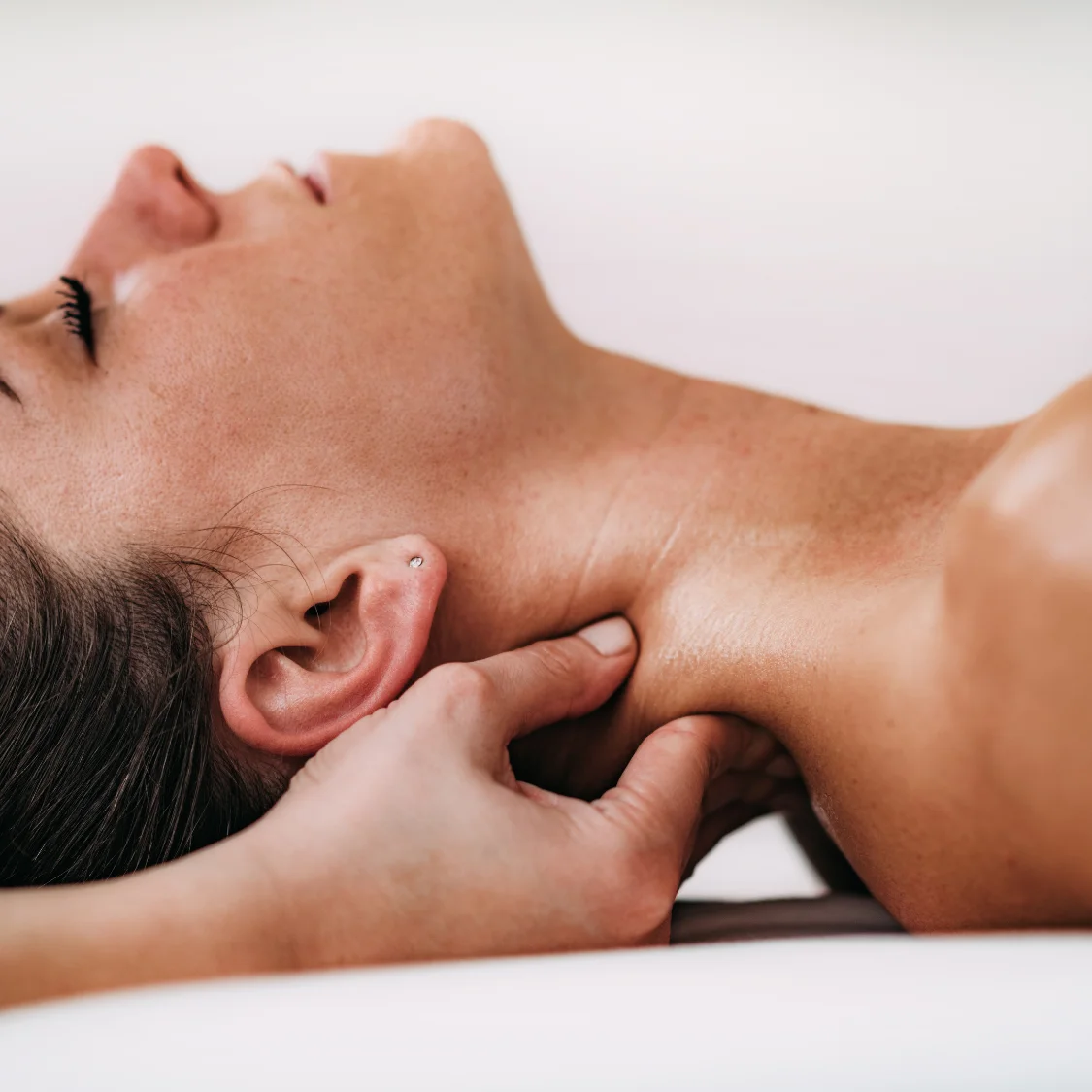 Physiotherapist treating neck and cervical spine pain