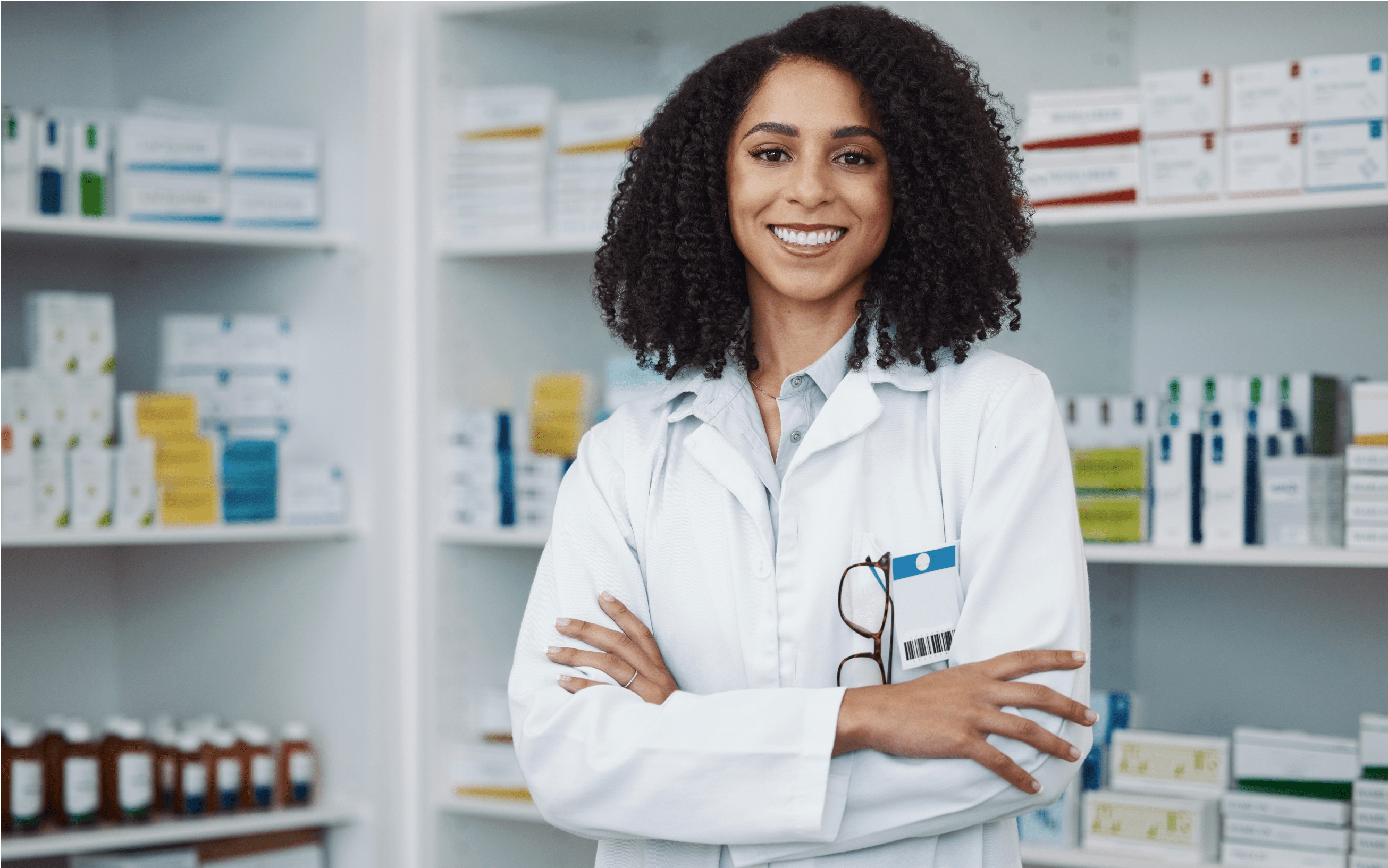 Hero banner image — generic stock photo of a smiling pharmacist (not the actual premises or staff)