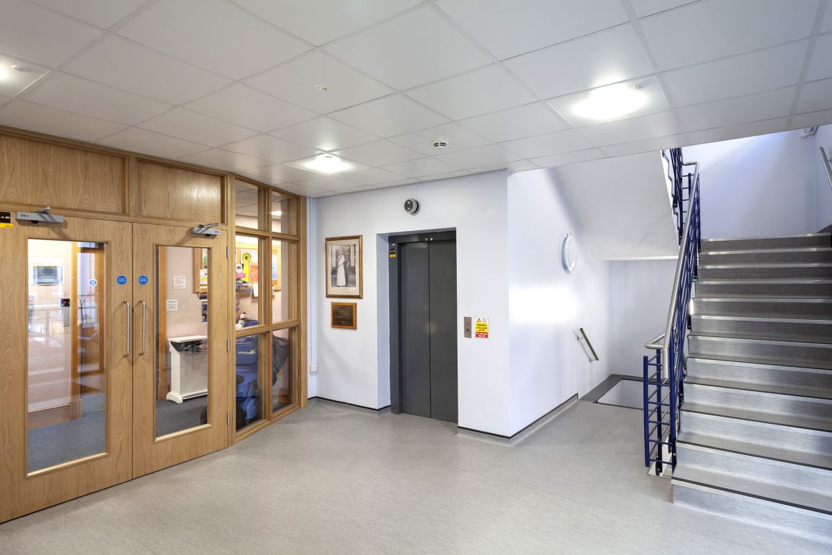 Refurbished Chapter House lobby with lift, staircase and reception doors