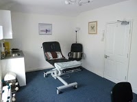 Treatment room with couch at the Southville Clinic building, Bristol