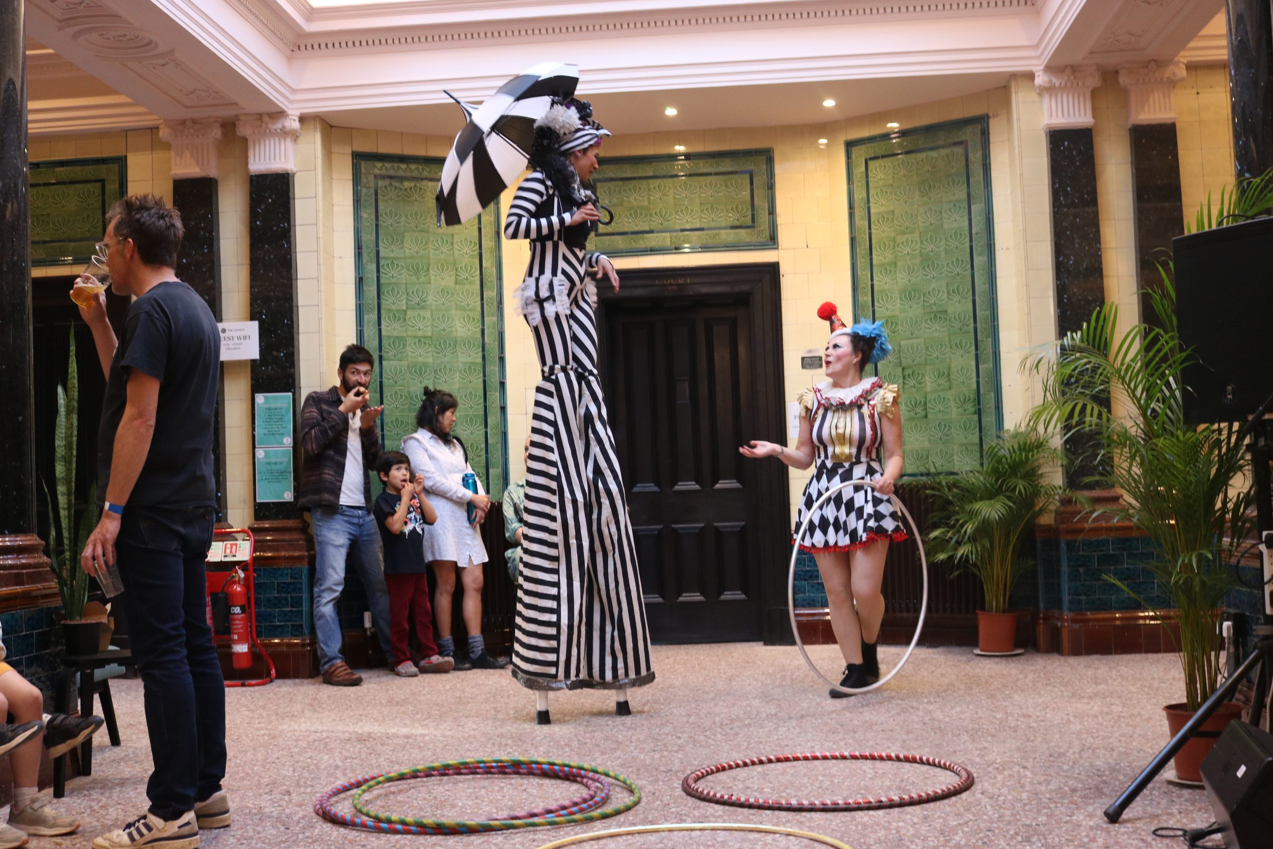 Launch event at The Courts with stilt walkers