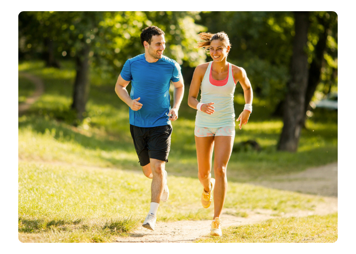 Couple jogging together, representing active healthy living and bone health