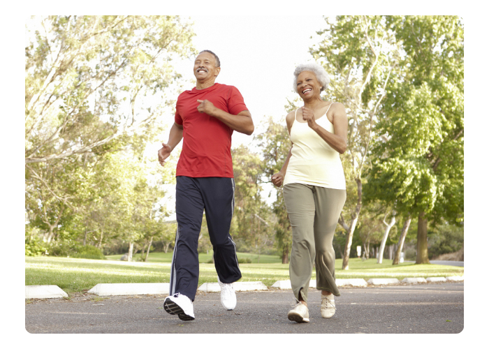 Elderly couple jogging outdoors, demonstrating healthy ageing and bone strength