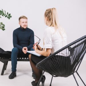 Counselling session with therapist and client