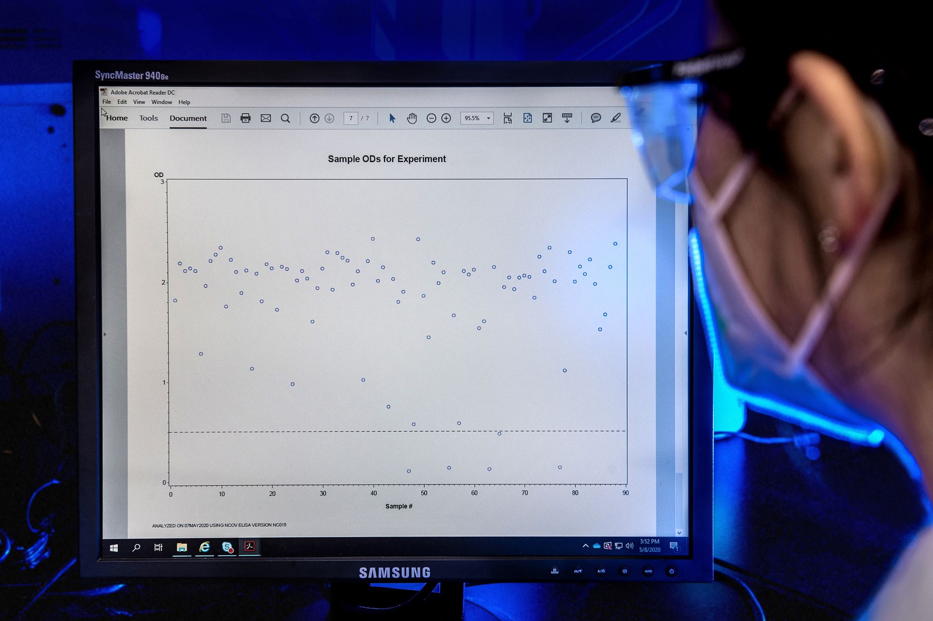 Person looking at a graph (homepage Test Results card, generic stock photo)