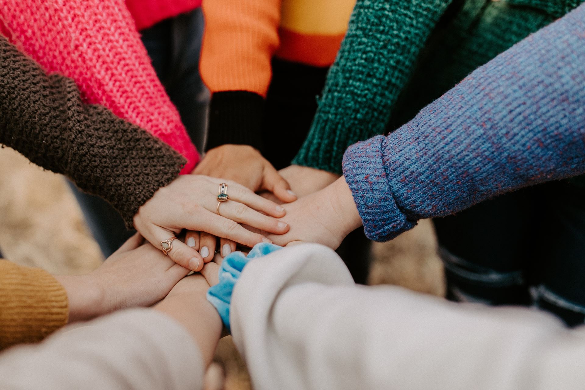 hands touching hands (homepage Join the surgery card, generic stock photo)