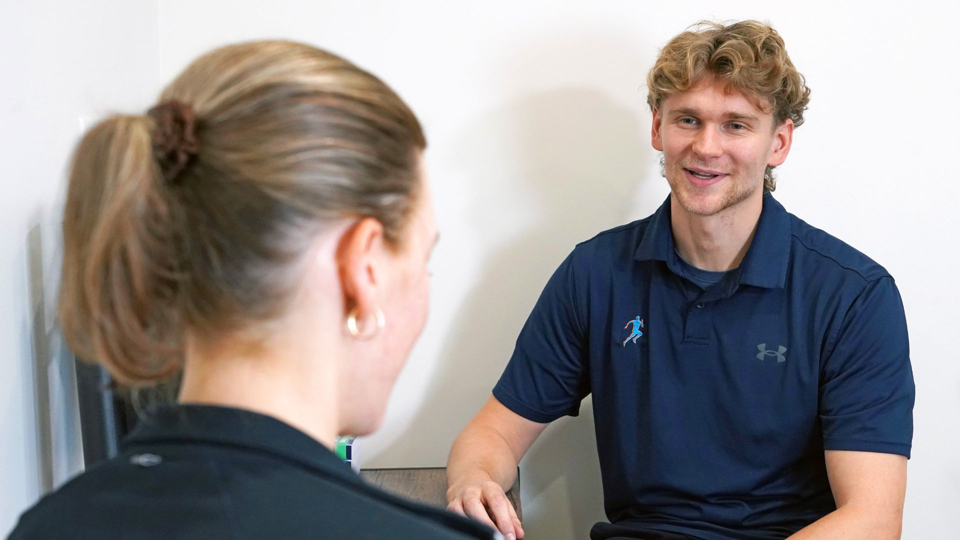 Physiotherapist and patient during appointment at ProSport