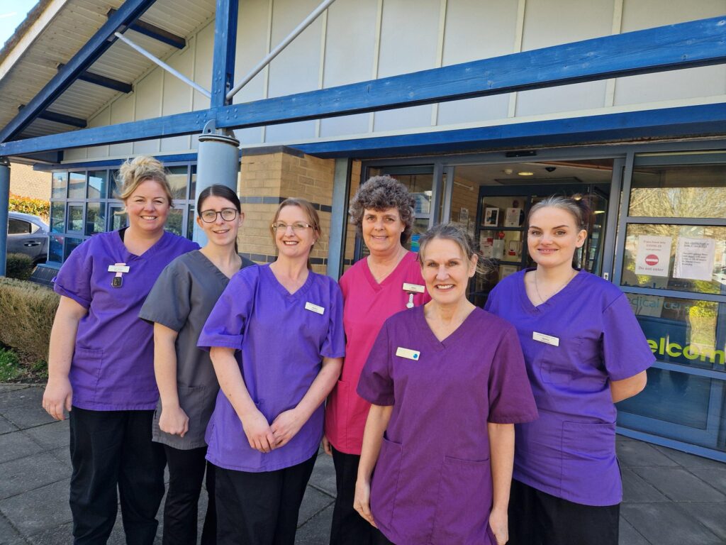 Nursing team group photo in the treatment room (interior)