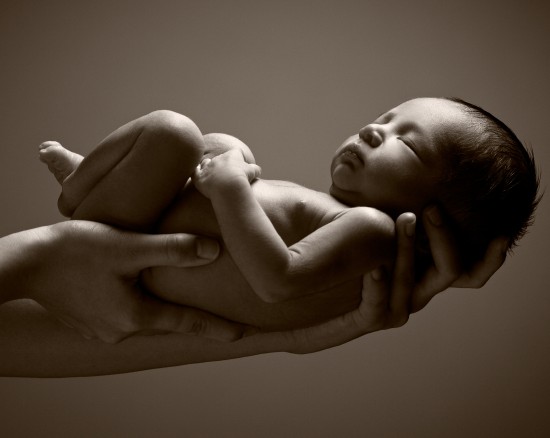 Paediatric / cranial osteopathy - baby in hands