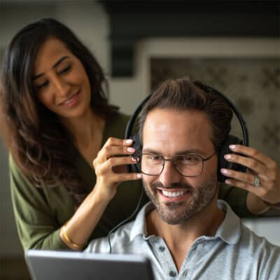 Audiologist performing a hearing assessment