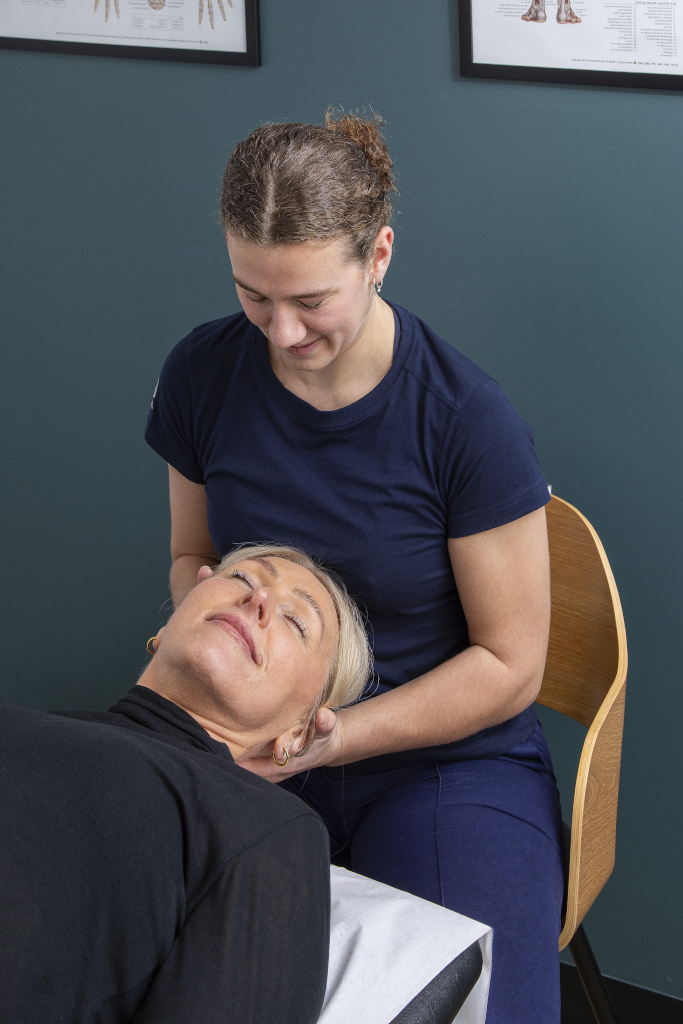 Bronwen from Yeadon Podiatry & Physiotherapy Centre treating a patient with neck pain