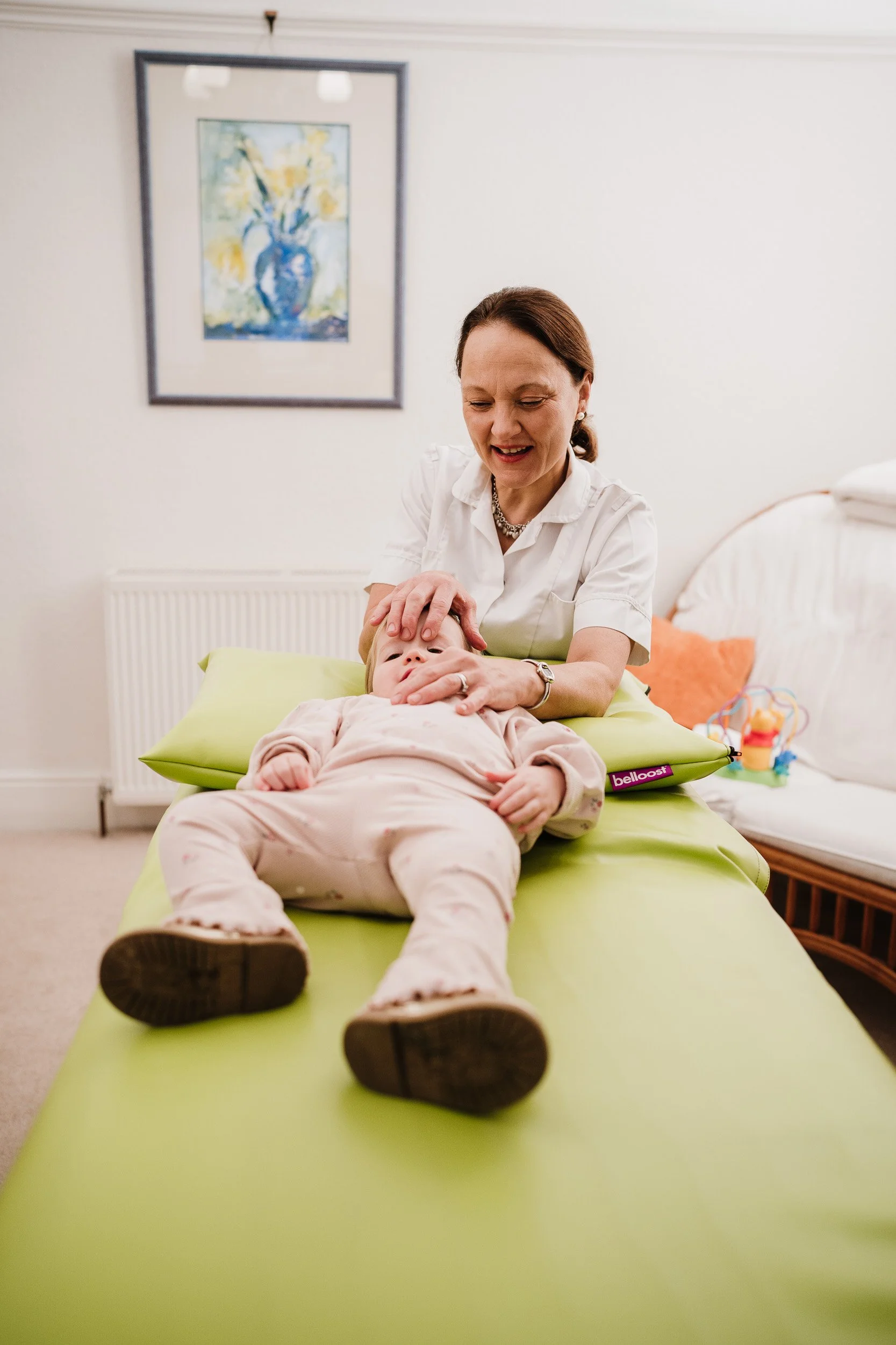 Osteopath treating baby